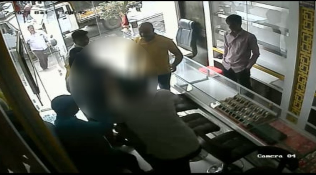 police beaten a Jewelery Shopkeeper