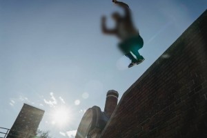 Youth jumps from building