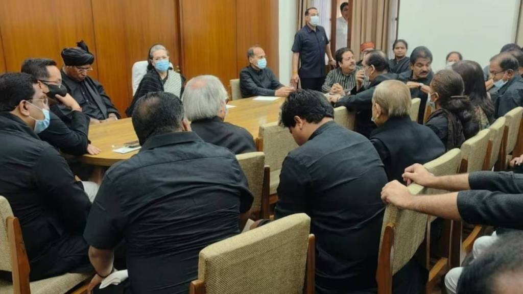 Rahul Gandhi disqualification Opposition MPs wear black clothes to protest in Parliament