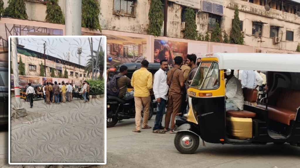 Local rickshaw pullers gather at the entrance of Regency Anantham Housing Complex in Dombivli