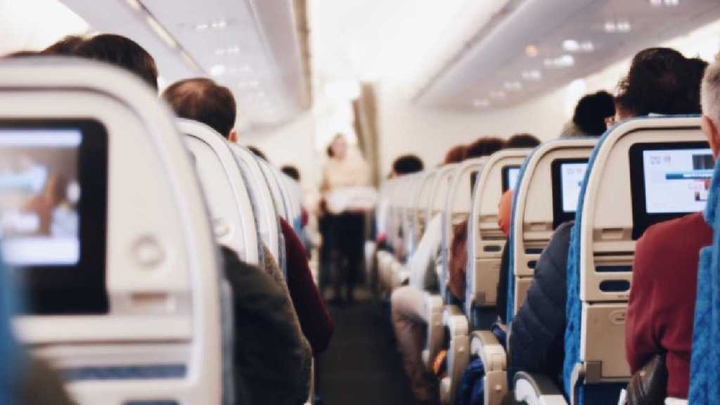 passengers opens emergency doors in flight