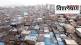 What is the new slum redevelopment strategy?