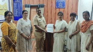 Officials of Dombivli Women's Federation while giving a statement to the senior police officer of Ulhasnagar