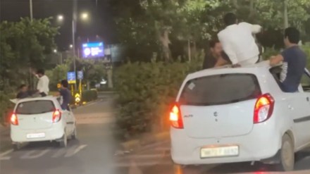 Viral Video of youngsters drinking alcohol and doing push ups on roof of the moving car