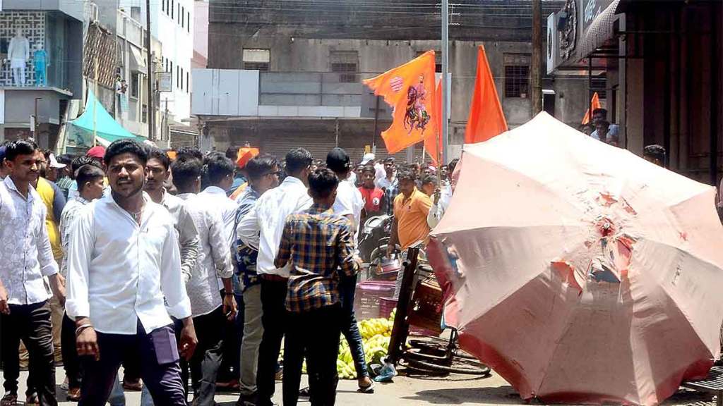 crowd overturned street vendor carts