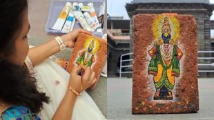 picture of Vitthal painted on a brick