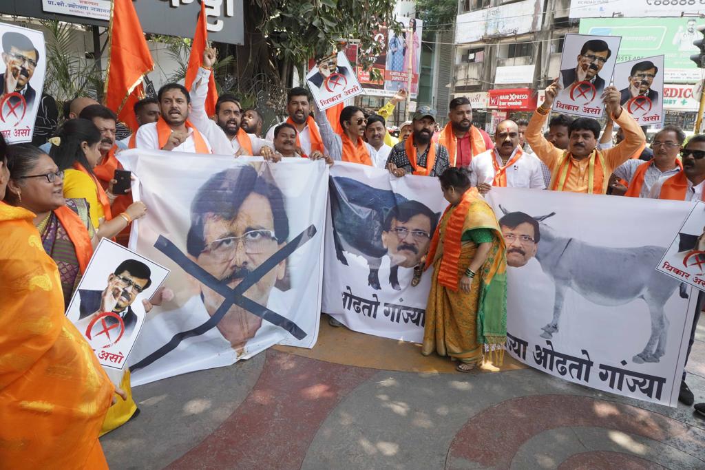 Shivsena Workers Spits On Sanjay Raut Face Banner Morph Picture With Donkey Shinde Group Ladies Beats With Shoes Photos Viral