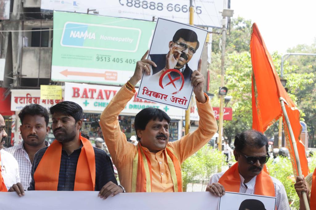 Shivsena Workers Spits On Sanjay Raut Face Banner Morph Picture With Donkey Shinde Group Ladies Beats With Shoes Photos Viral