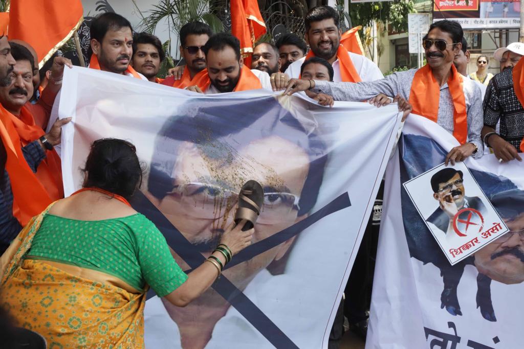 Shivsena Workers Spits On Sanjay Raut Face Banner Morph Picture With Donkey Shinde Group Ladies Beats With Shoes Photos Viral