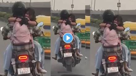 Couple doing romance while driving bike on delhi road and break traffic rules then what happened video trending of internet