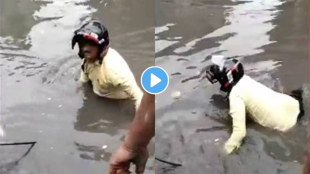 delhi weather rain man lost his bike in drain sangam vihar video viral on social media