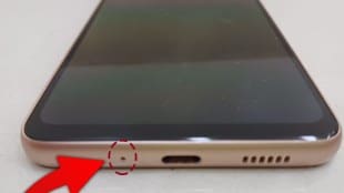 Tiny Hole At Smartphone Bottom