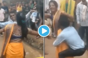Indian Aunty Dancing In Wedding Wearing Saree Falls on Face As Husband Picks Her From Waist Watch Video Make You Laugh