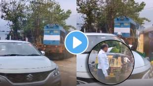 irctc news indian train stucked between vehicles in traffic jam in banaras watch viral video people says its happens only in india
