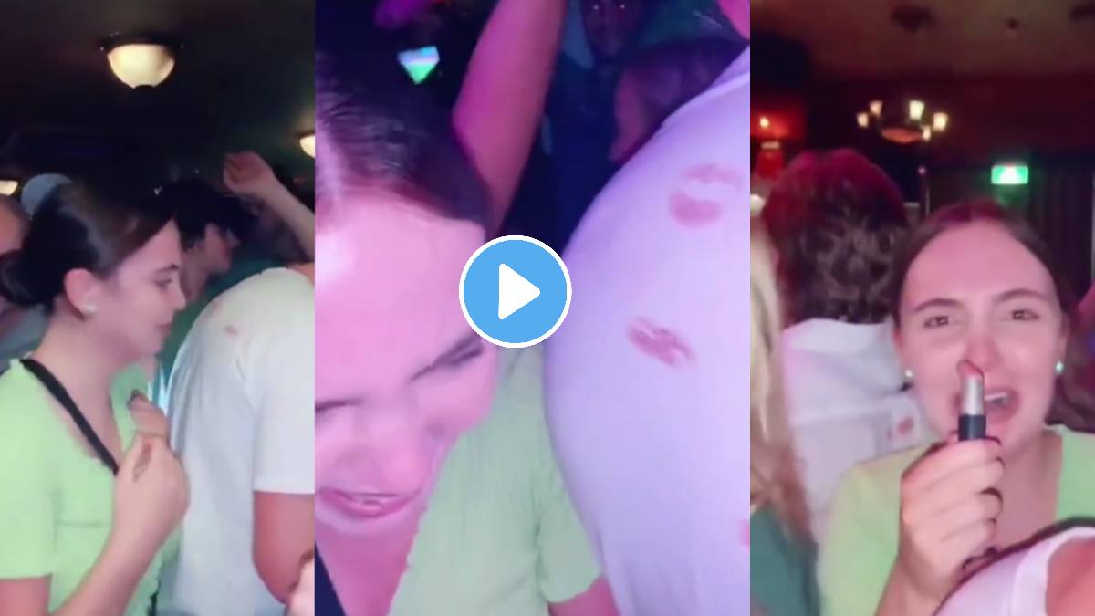 Woman on ‘rampage’ secretly puts lipstick marks on men's shirts at pub while dancing; watch viral video on social media
