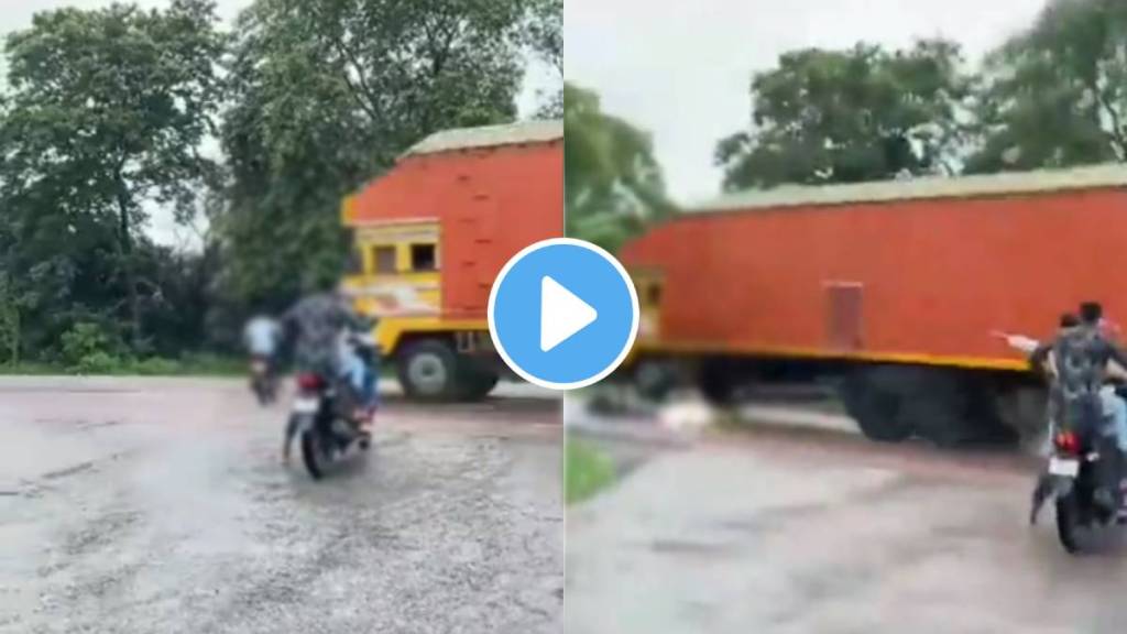 freaky accident as biker talking on mobile gets struck by speeding truck viral video shows dangers of using phone while riding