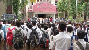 students along with parents protest at zilla parishad