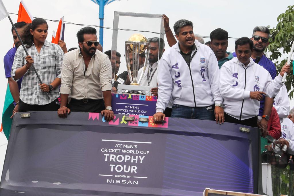 ODI World Cup Trophy 2023 reaches Pune grand procession from Senapati Bapat Road Crowd of Pune residents to see the trophy