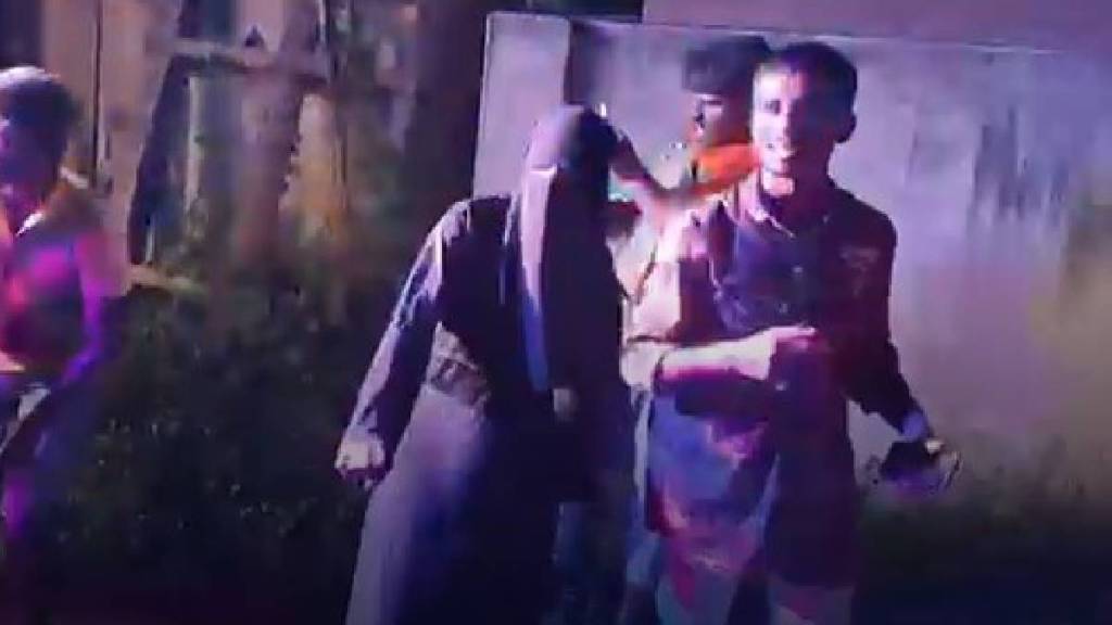 Man wearing burqa dances during Ganesh procession in Tamil Nadu