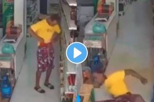 VIDEO: चोरानं अंडरवेअरमध्ये लपवली दारुची बाटली; पुढच्याच क्षणी व्यक्तीसोबत घडलं भयानक Man fell in store while theft whisky bottle funny video viral on social media trending