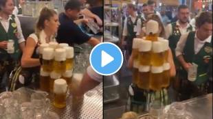 waitress carry 13 full beer glasses with two hands at once amazing balance video viral