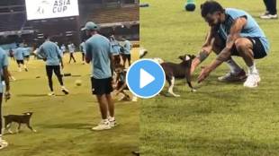 Virat Kohli playing with a puppy during Team India's practice session