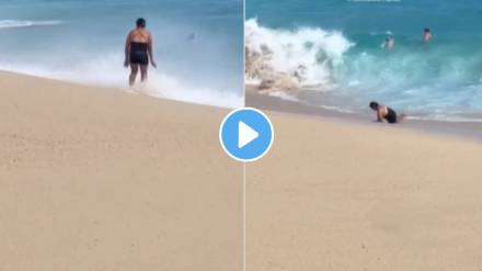 Viral Man Saved Life Of A Woman Who Drowned Away With Sea Waves Shocking Video Viral On Social Media