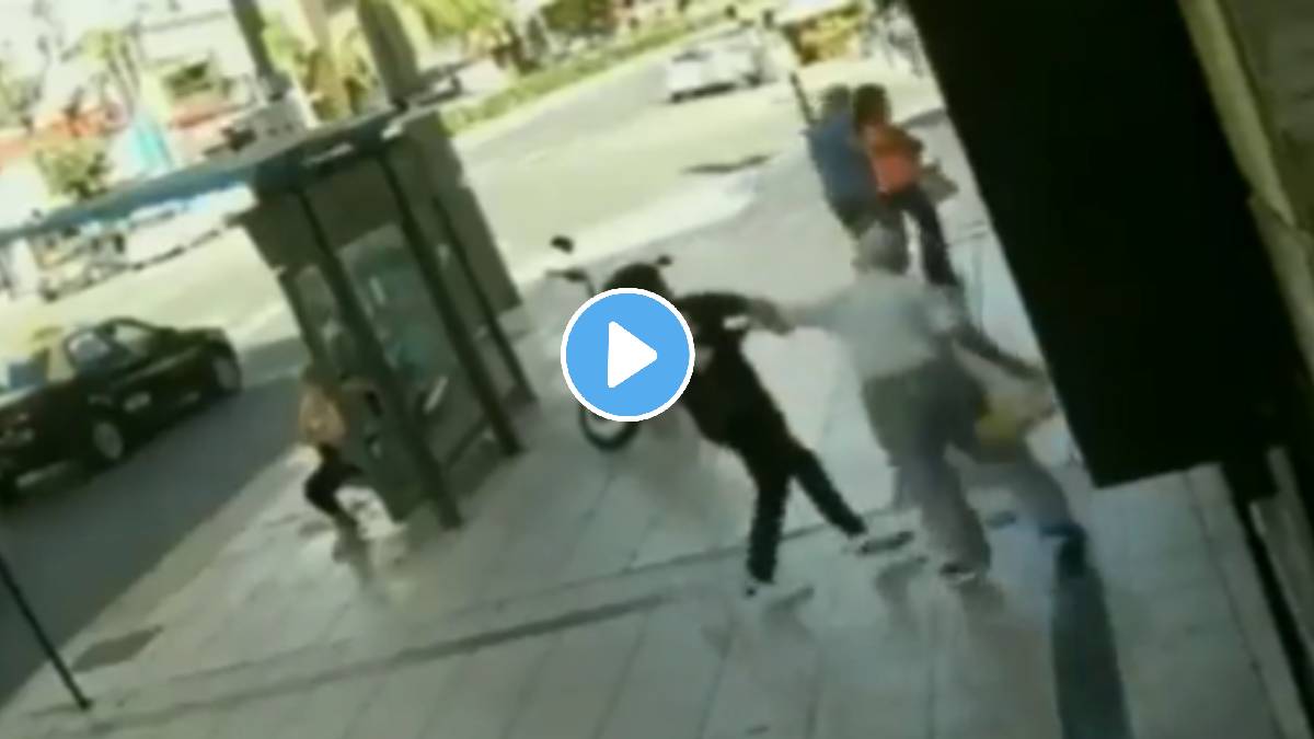 boy hit older man in public space other man saved elder man beaten by young boy shocking video viral