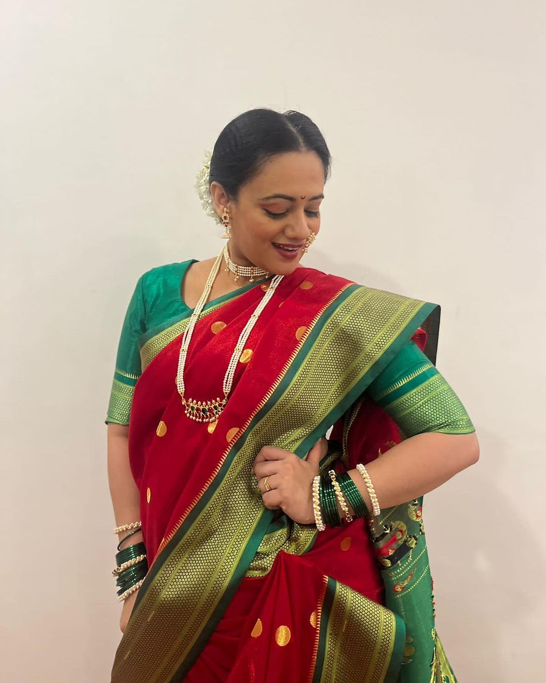 Spruha Joshi Red Nauvari Saree Look