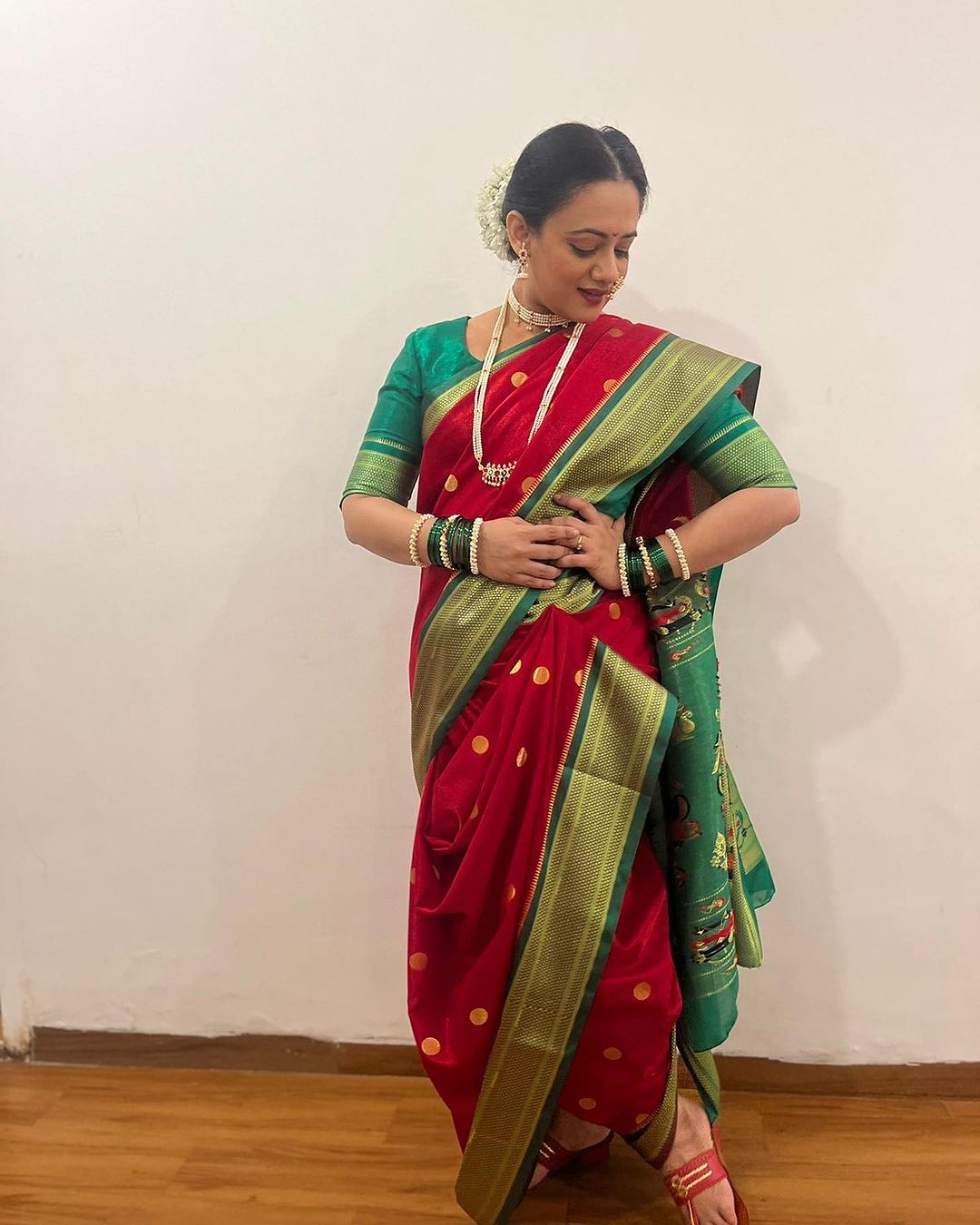 Spruha Joshi Red Nauvari Saree Look