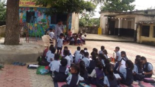 zilla parishad school students at gondekhari learning under tree