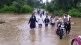 kanhalgaon bridge flooded rain, students travel through flood water