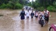 kanhalgaon bridge flooded rain, students travel through flood water