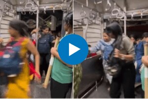 women rushing to get into moving Mumbai local train