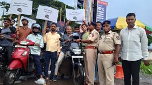 hundreds of helmets were distributed to citizens from the money left with ganpati mandal
