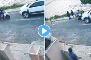 Viral Video : तरुणींना केली मदत अन् स्वतःवर ओढवून घेतले संकट… Girls riding scooty funny Incidence captured in CCTV footage
