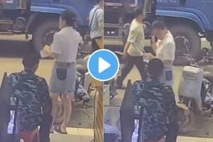 व्यक्तीने मस्करीच्या नादात फोनवर बोलणाऱ्या महिलेच्या स्कर्टला लावली आग… Video पाहून व्हाल चकित! An unknown person sets fire to the skirt of a woman standing outside a shop