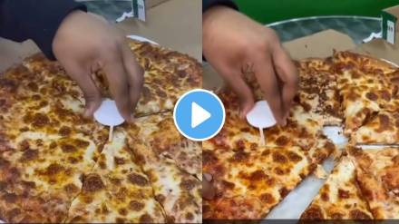 Demonstrated use of a pizza table for cutting pizza slices