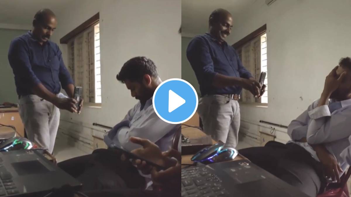 A student sleeps in the classroom and the teacher records the video of student in mobile phone