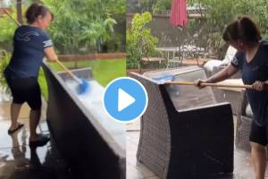 Mother washed the household items in the rain water