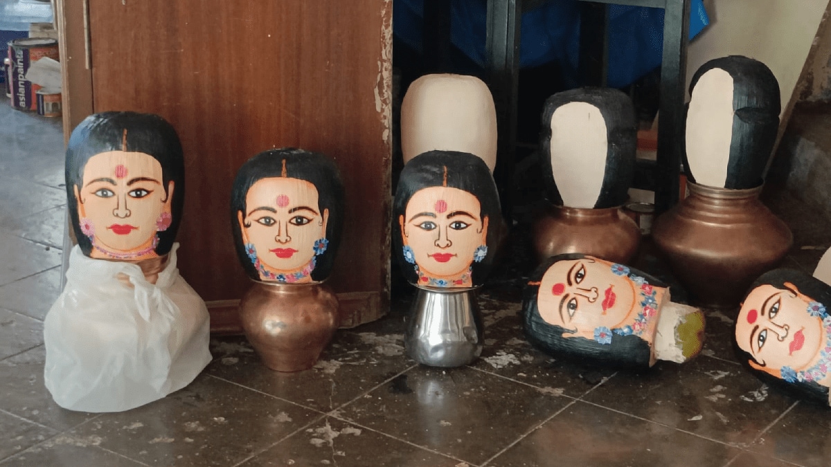 Nagaon, Uran, tradition worship goddess masks coconut shells Ghat Navratri festival