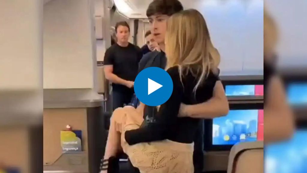 video of son lifts disabled mom from wheelchai to board plane