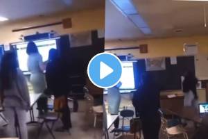 students hurl iron chair at teacher in classroom during argument teacher unconcious michigan usa video viral