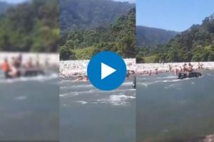viral video Three men rescued after they drive SUV into fast flowing river