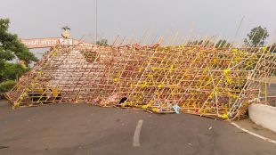 wooden entrance gate of the Koradi temple area collapsed