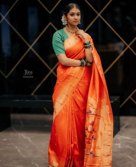 Rinku Rajguru Orange Paithani Saree