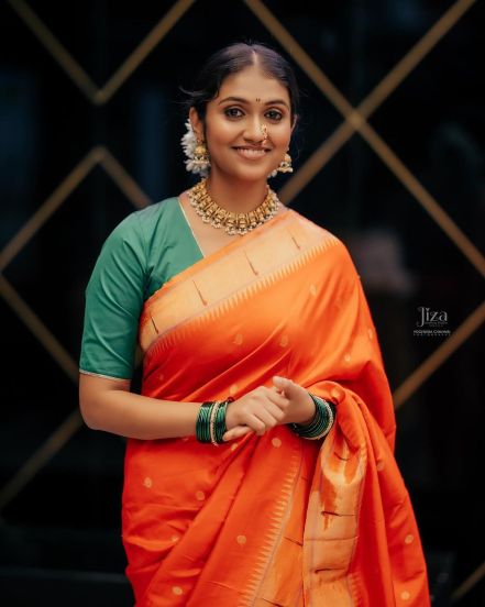 Rinku Rajguru Orange Paithani Saree