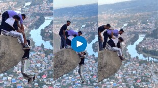 friends masti video during travel Hanging his friend from the edge of a high rock
