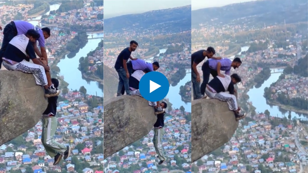 friends masti video during travel Hanging his friend from the edge of a high rock