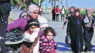 Evacuation of patients staff displaced from Shifa Hospital as Israel attacks targets in southern Gaza